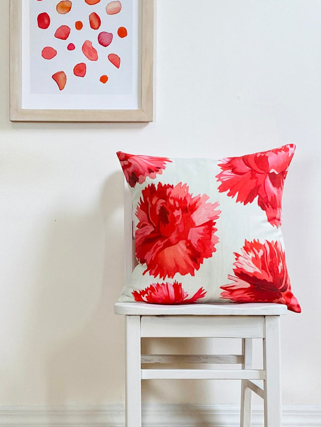 Red Carnations on Snow Throw Pillow